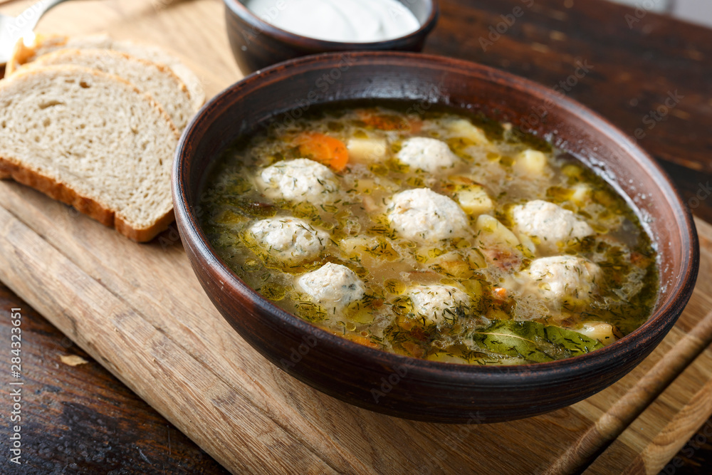 soup with meatballs in a plate soup with meatballs in a plate