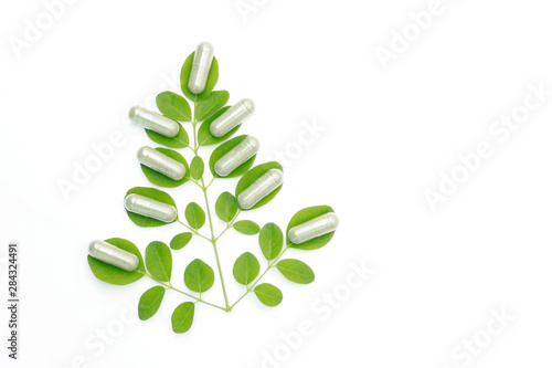 Herbal supplement on white background 