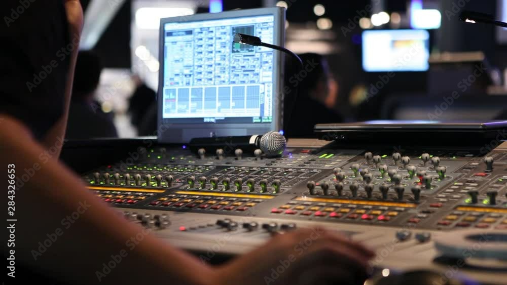 close ups on sound engineer with studio sound and visual mixer used for media and events directing and recording studios