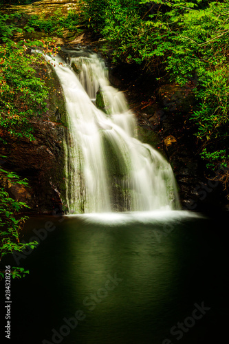 Water cascades over Blue Hole Falls in Hiawassee  Georgia.