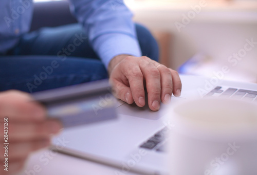 businessman working at a computer hands closeup