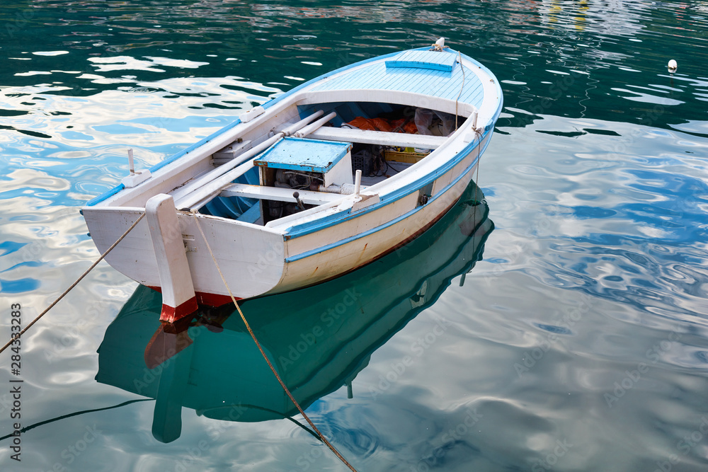 Traditional fishing boat in the port. Pucisca, Brac Island, Croatia.