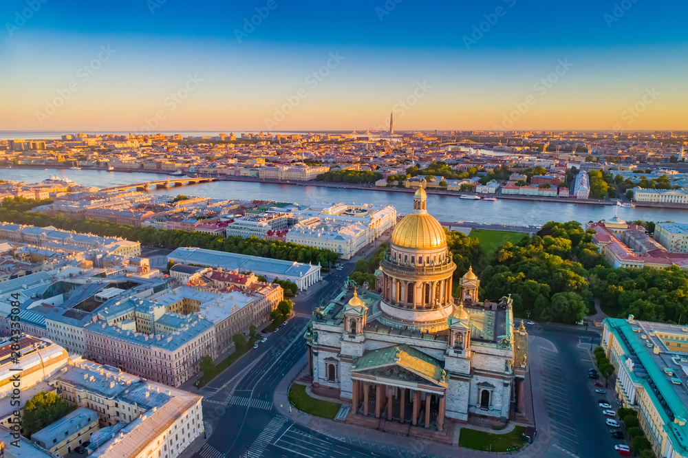 Saint Petersburg. Russia. St. Isaac's Cathedral aerial view. St. Isaac's Cathedral on the background of sunrise. Bus tours of Saint Petersburg. Traveling to the cities of Russia. Russian Federation.