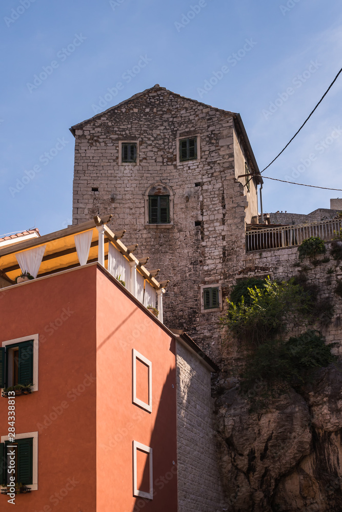 Fototapeta premium Houses on a hill in Sibenik, Croatia