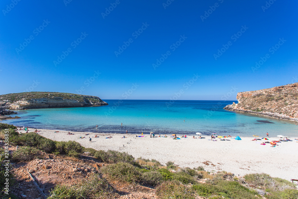 Lampedusa Island Sicily - Rabbit Beach with no people and Rabbit Island Lampedusa “Spiaggia dei Conigli” with turquoise water white sand at paradise beach.