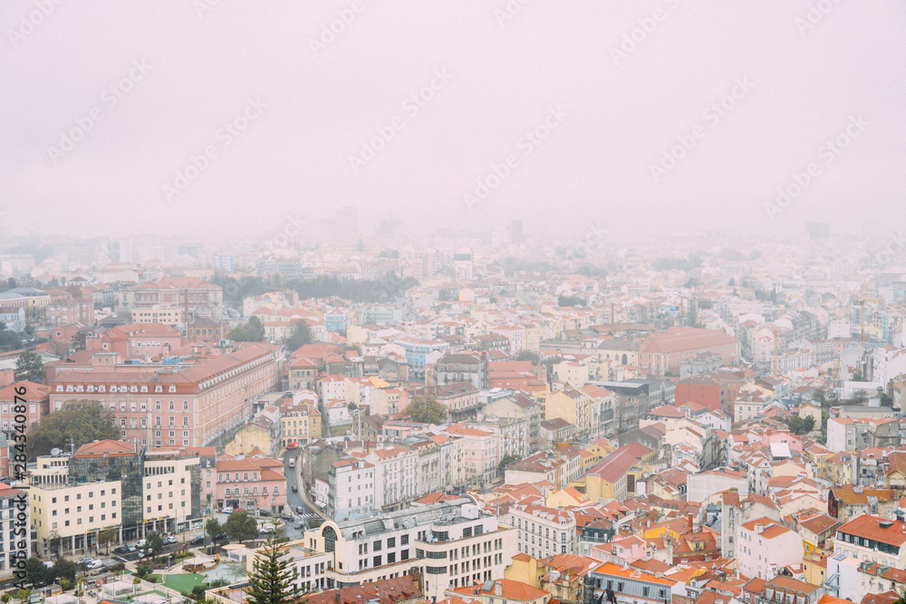 Panoramic view of a city on a foggy day