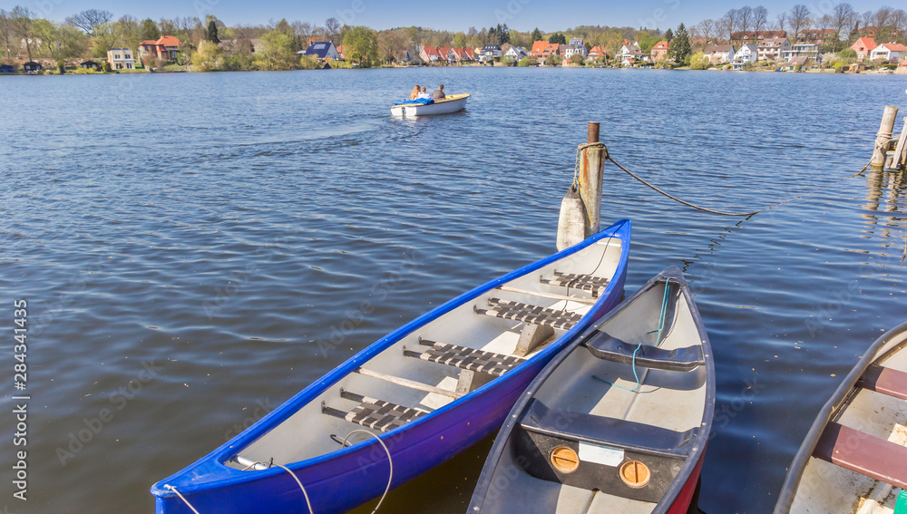 Canoes at the Stadtsee lake in Molln, Germany