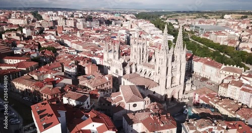View from drone of impressive Burgos Gothic Cathedral on background of cityscape in summer day, Spain photo