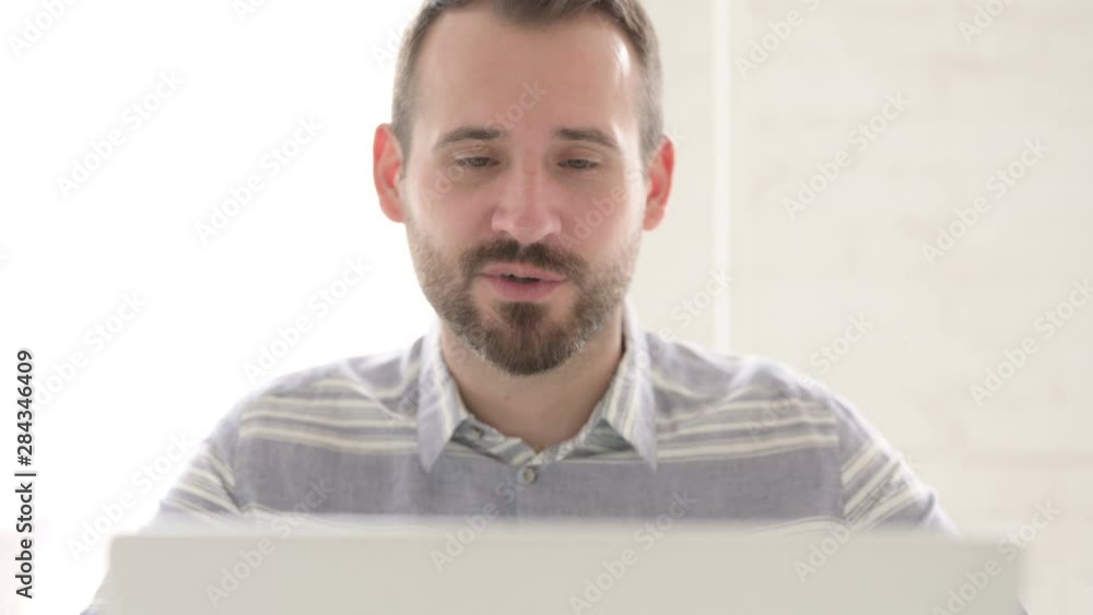 Close Up of Video Chat by Adult Young Man Close Up of Video Chat by Adult Young Man