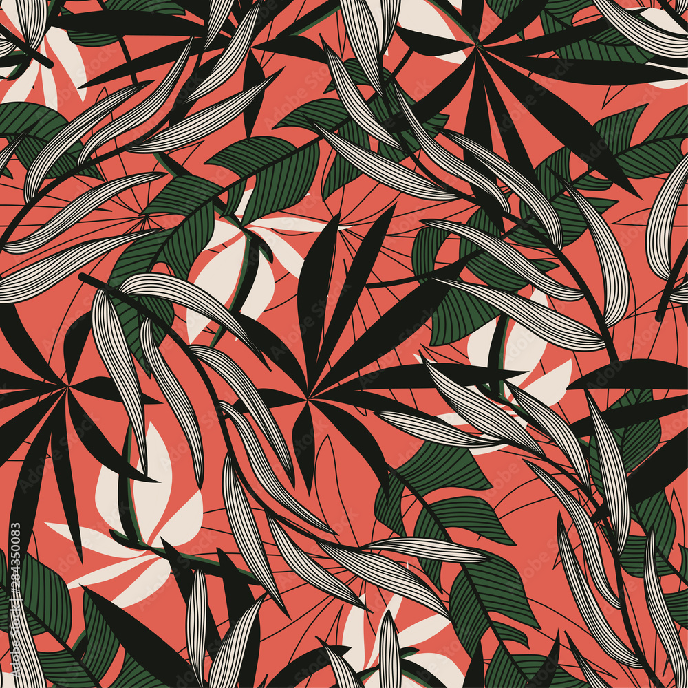 Original abstract seamless pattern with colorful tropical leaves and plants on red background. Vector design. Jungle print. Floral background. Printing and textiles. Exotic tropics. Summer.