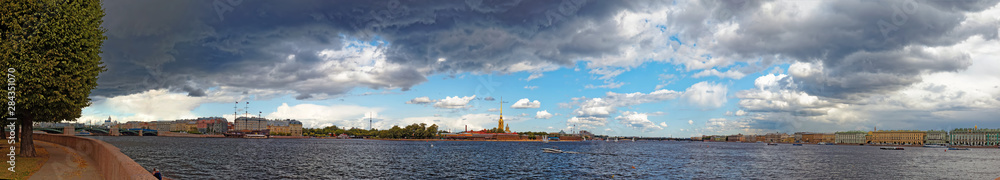Peter and Paul fortress panoramic view. Saint-Petersburg, Russia. Ships on Neva river. Wide angle view.