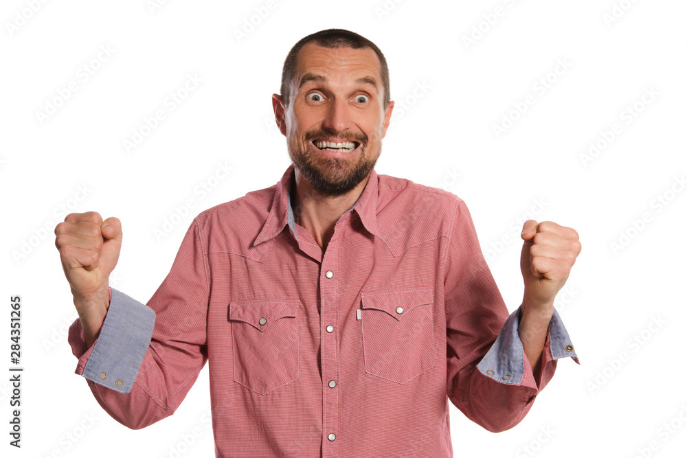 Naklejka premium Middle-aged man with beard, mustache and short haircut posing isolated on white background. Sincere emotions concept.