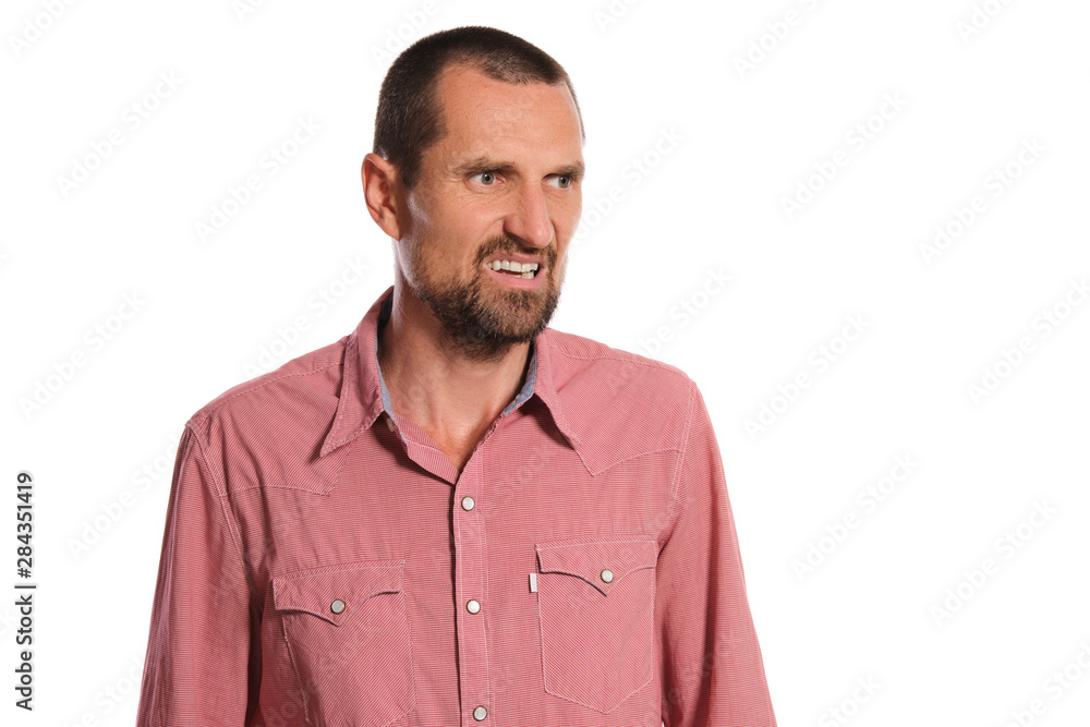 Middle-aged man with beard, mustache and short haircut posing isolated on white background. Sincere emotions concept. Middle-aged man with beard, mustache and short haircut posing isolated on white background. Sincere emotions concept.