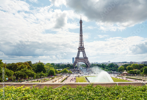 PARIS, FRANCE - July 31, 2019: Eiffel Tower, nickname La dame de fer, the iron lady, The tower has become the most prominent symbol of  Paris. Paris, France photo