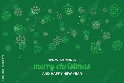 Christmas illustration with various small snowflakes on gradient background in green colors