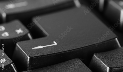 Enter key, computer keyboard, arrow button background and texture, side view