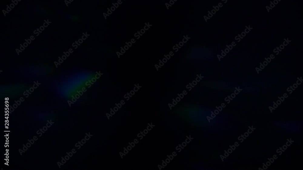 Colorful Light pulses and glows. Beautiful light leak on dark background with. Real lens flares perfect for abstract motion background. Dreamy bokeh. Blue light. Colorful Light pulses and glows. Beautiful light leak on dark background with. Real lens flares perfect for abstract motion background. Dreamy bokeh. Blue light.