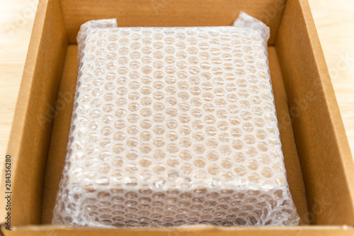 Bubbles covering the box by bubble wrap for protection product