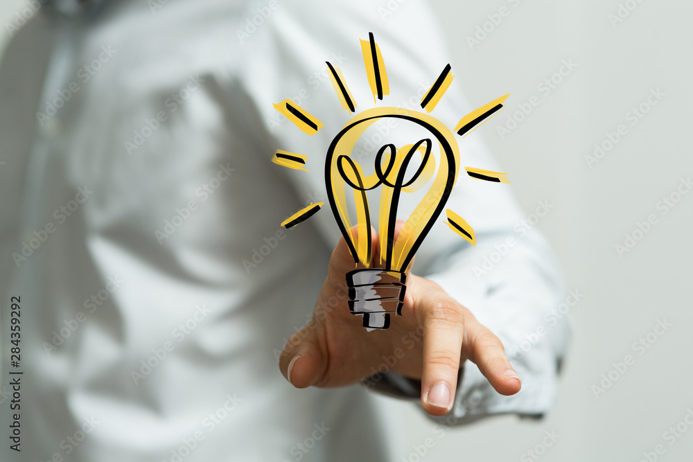 touching light bulbs, new ideas with innovative technology and creativity. touching light bulbs, new ideas with innovative technology and creativity.