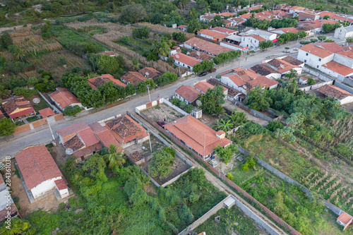 Aerial roof top of simple houses in countryside 