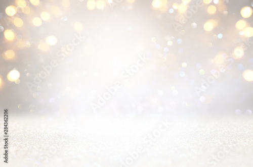 blackground of abstract glitter lights. silver and gold. de-focused © tomertu
