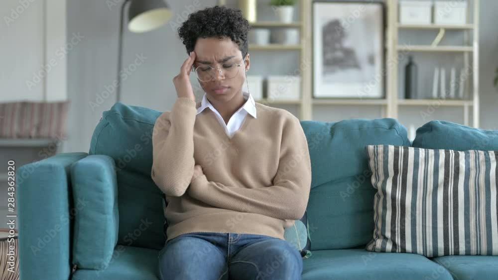 Stressed African women Sitting on The Couch Stressed African women Sitting on The Couch