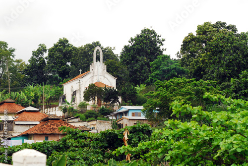 Sao Tome, Roca Agostinho Neto, church amid the green vegetation photo