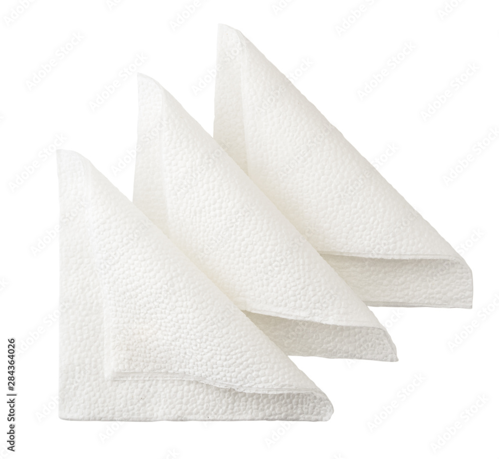 Three napkins folded in half on a white background. The view of the top. Three napkins folded in half on a white background. The view of the top.