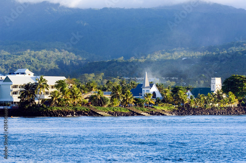 Aggie Greyís Hotel (left) and local churches in Apia, Upolu Island, Western Samoa photo