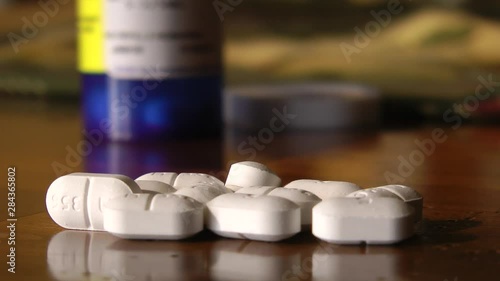 hydrocodone pills on table photo