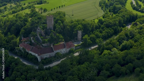 Aerial view of the castle Ehrenberg close to the village Heinsheim in Germany. Pan to the left beside the castle. photo