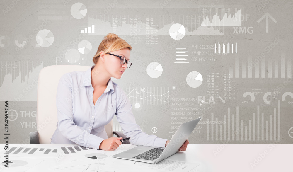 Business person sitting at desk with financial change, and report diagram concept Business person sitting at desk with financial change, and report diagram concept