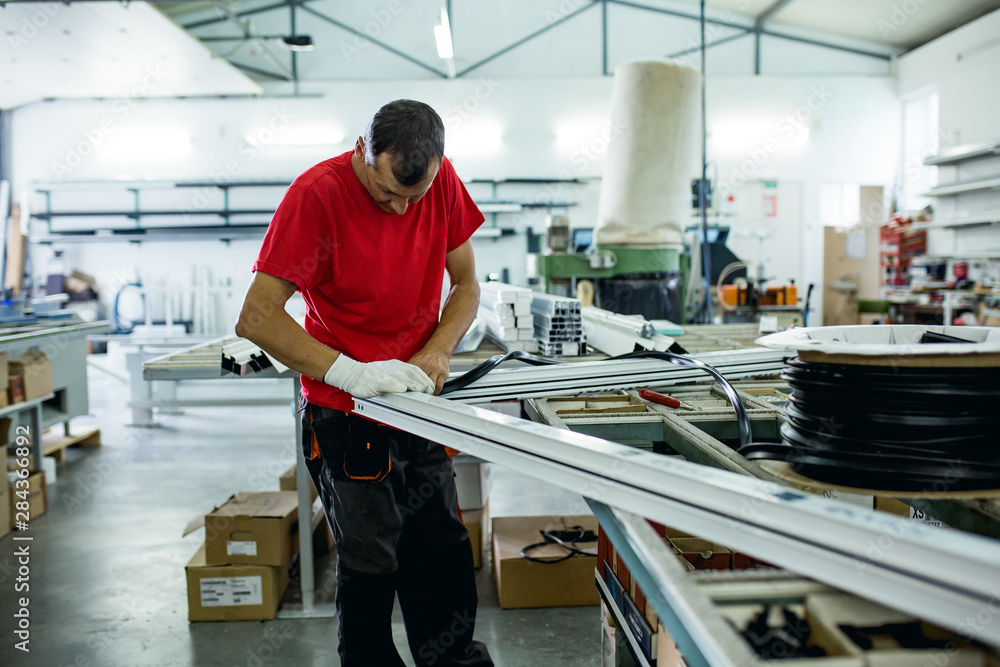 Hard work in aluminium and pvc factory Hard work in aluminium and pvc factory