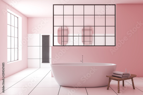 Pink and white tile bathroom interior with tub