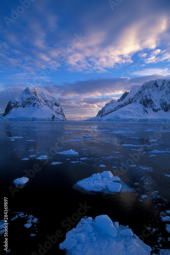 Antarctica, sunrise near Lemaire Channel, Antarctic Peninsula, in late summer.
