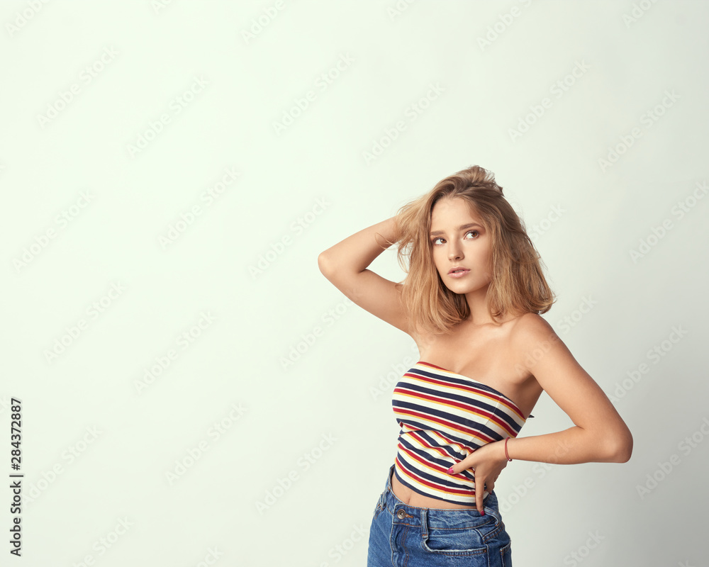 young cute and adorable girl on empty background, blond hair, empty for description, close up studio shot, dreamy look young cute and adorable girl on empty background, blond hair, empty for description, close up studio shot, dreamy look