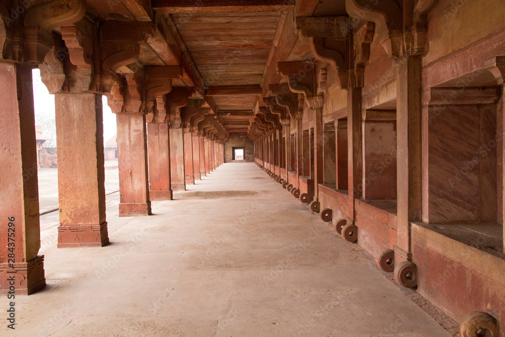 India, Utter Pradesh. Agra Fort (Red Fort) is UNESCO World Heritage Site. Richly decorated semi-circular red sandstone fort complex with double ramparts and monuments.