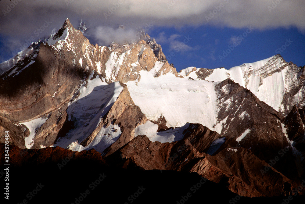 Asia, India, Ladakh, Nun-Kun Peak. Glaciers hang from the flanks of Nun-Kun Massif, in Zanskar Valley, India.