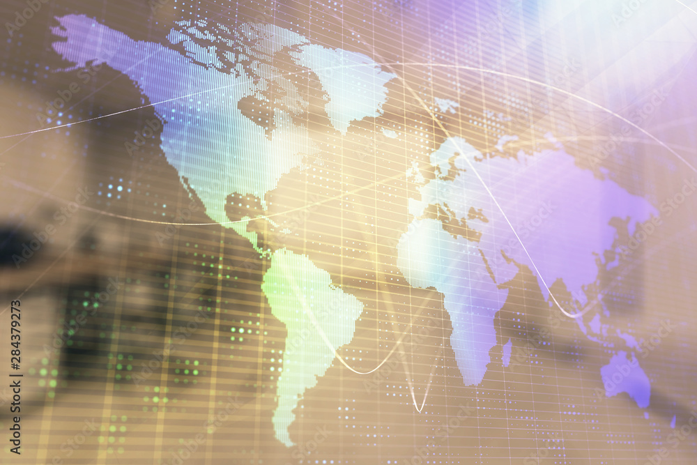 Obraz premium World map with trading desk bank office interior on background. Multi exposure. Concept of international finance