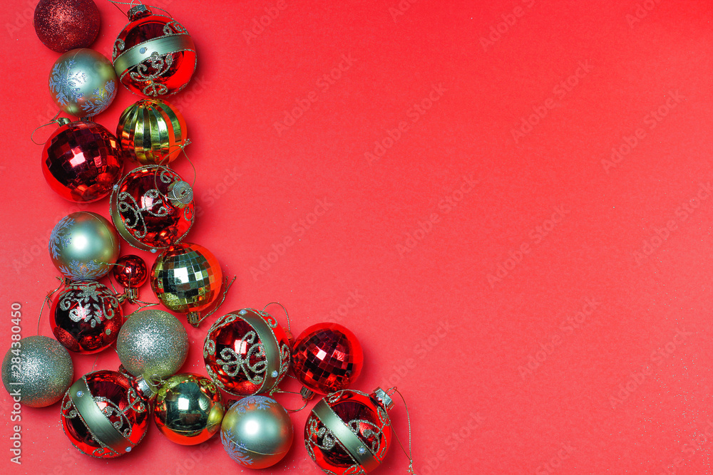 Christmas ornaments decorations background. Classic red glass balls with glitter. Christmas ornaments decorations background. Classic red glass balls with glitter.