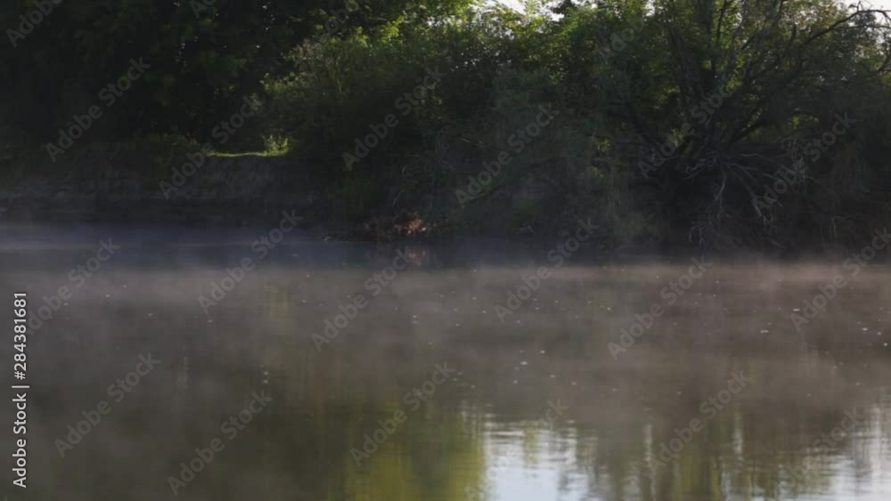 Early morning fog on river. Real time full hd video footage. Early morning fog on river. Real time full hd video footage.