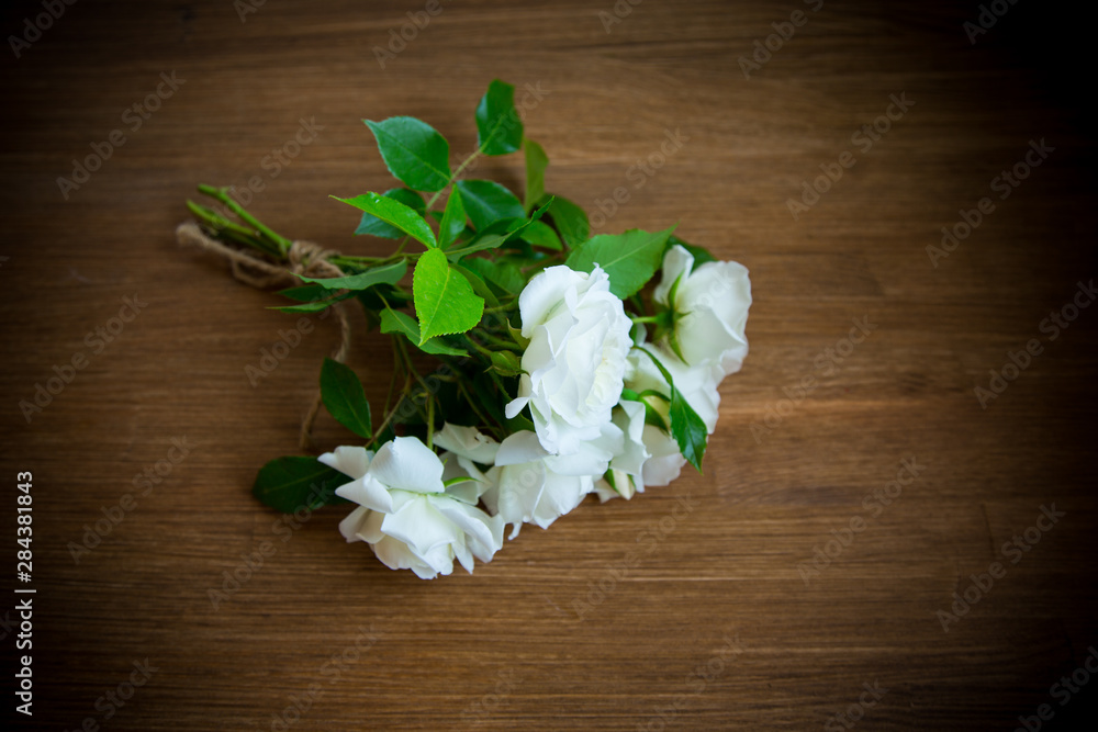 bouquet of beautiful white roses on table bouquet of beautiful white roses on table