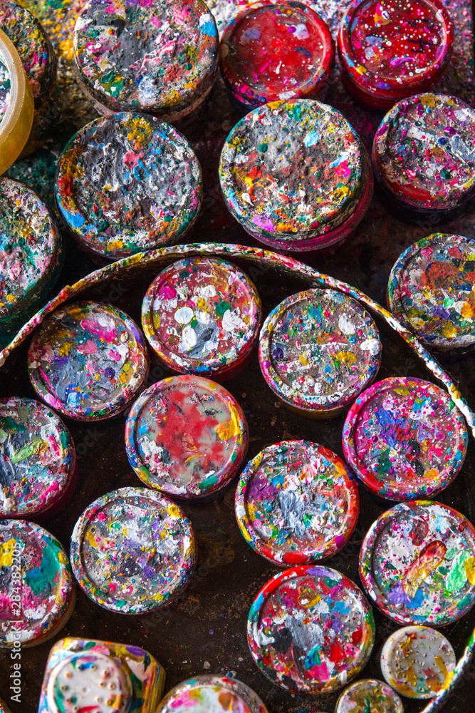 Thailand, Chiang Mai Province, Bo Sang. Umbrella factory. Jars of paint.