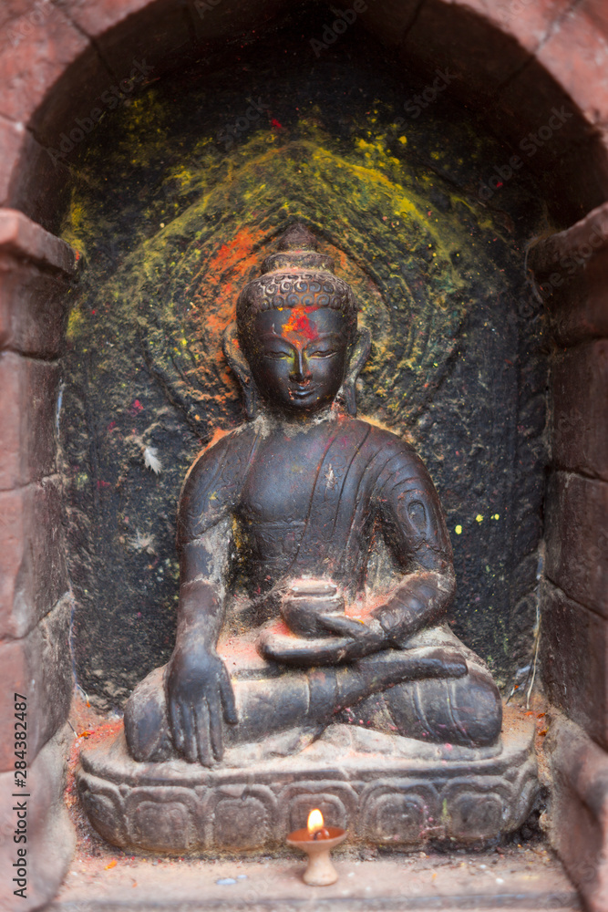 Obraz premium Buddha statue, Swayambhunath Temple, Kathmandu, Nepal also known as the Monkey Temple