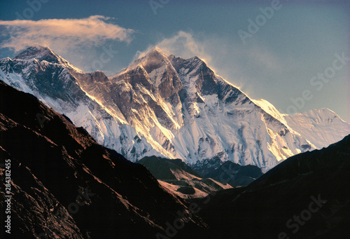 Asia, Nepal, Sagarmatha NP. Fierce winds whip snow off Mt. Everest, on the left, and Lhotse and Nuptse in Sagarmatha National Park, a World Heritage Site, in Nepal. © Ric Ergenbright/Danita Delimont