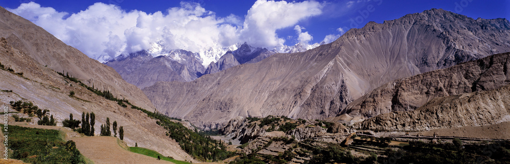 Pakistan, N-W Frontier Province, Hunza. The Karakoram Himalaya loom above the arid Nagar Valley in Hunza, North-West Frontier Province of Pakistan.