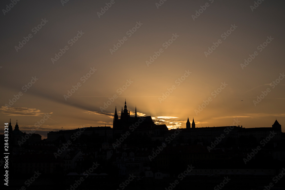 Silhouette of the St. Vitus Cathedral, Prague (Hradcany) Castle and Mala Strana district in Prague, Czech Republic, at sunset. Copy space.