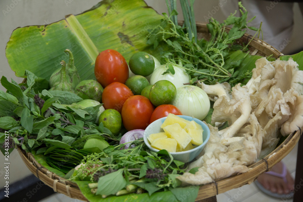 Thailand, Chiang Mai. Thai cooking school, preparing foods with basic ingredients of sprouts, leaves, vegetables and mushrooms plus limes. Thailand, Chiang Mai. Thai cooking school, preparing foods with basic ingredients of sprouts, leaves, vegetables and mushrooms plus limes.