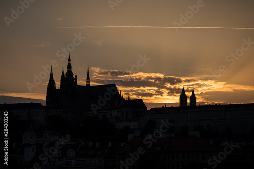Silhouette of the St. Vitus Cathedral, Prague (Hradcany) Castle and Mala Strana district in Prague, Czech Republic, at sunset. Copy space. © tuomaslehtinen