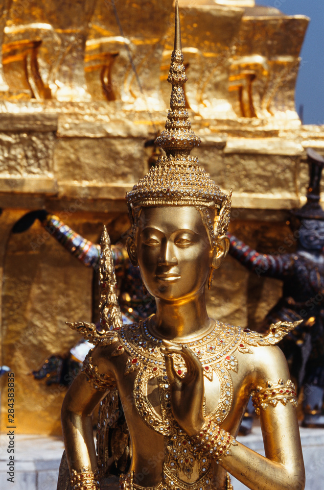 Thailand, Bangkok, Gold statue at grand palace Bangkok